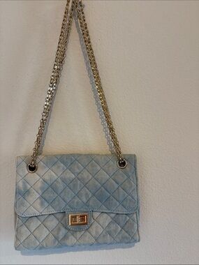 Light wash denim purse with gold tone hardware